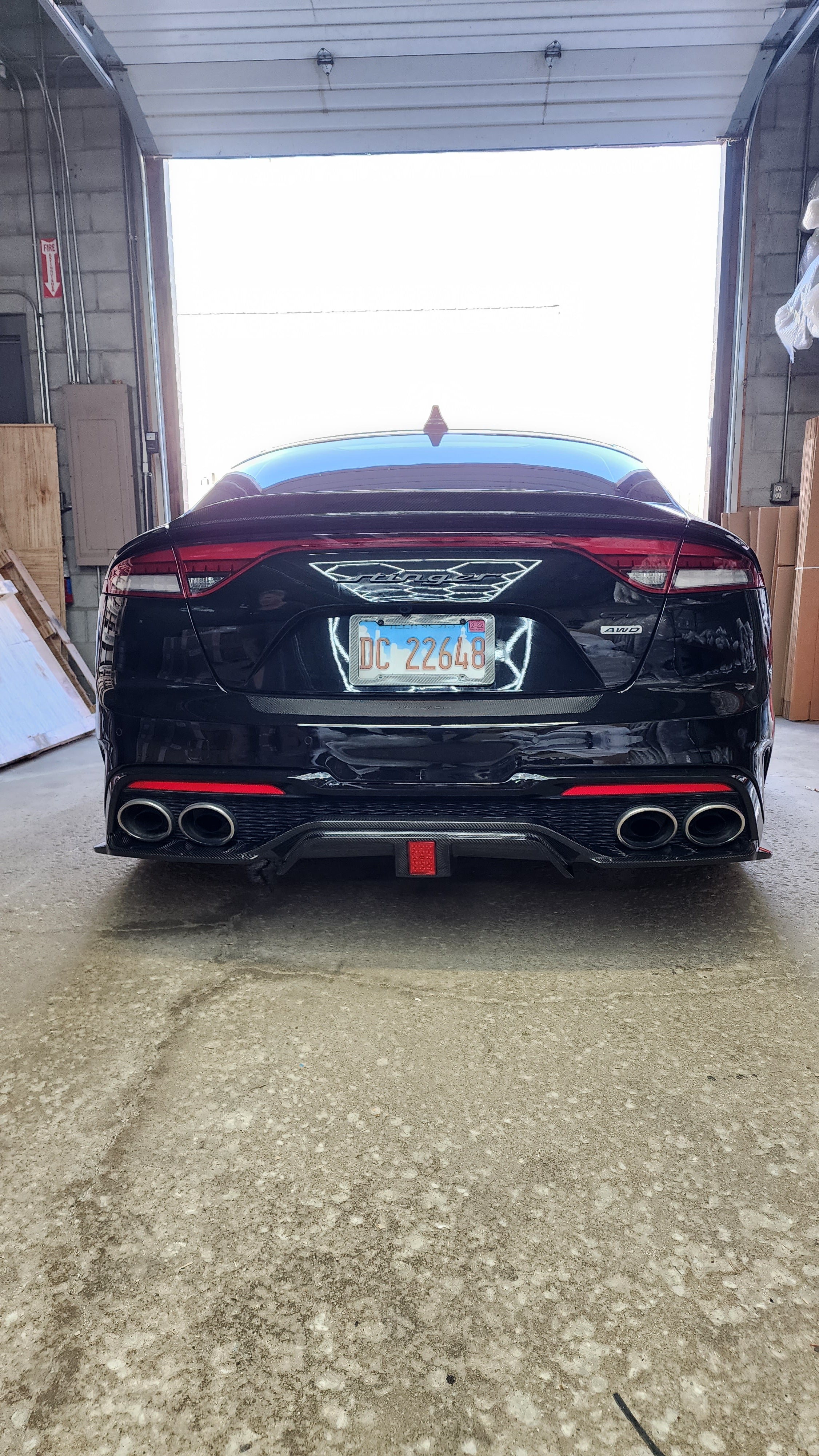 Close-up of the 2022' KIA STINGER's Carbon Fiber Diffuser, highlighting the quality carbon fiber weave and the 3rd Brake Light feature.
