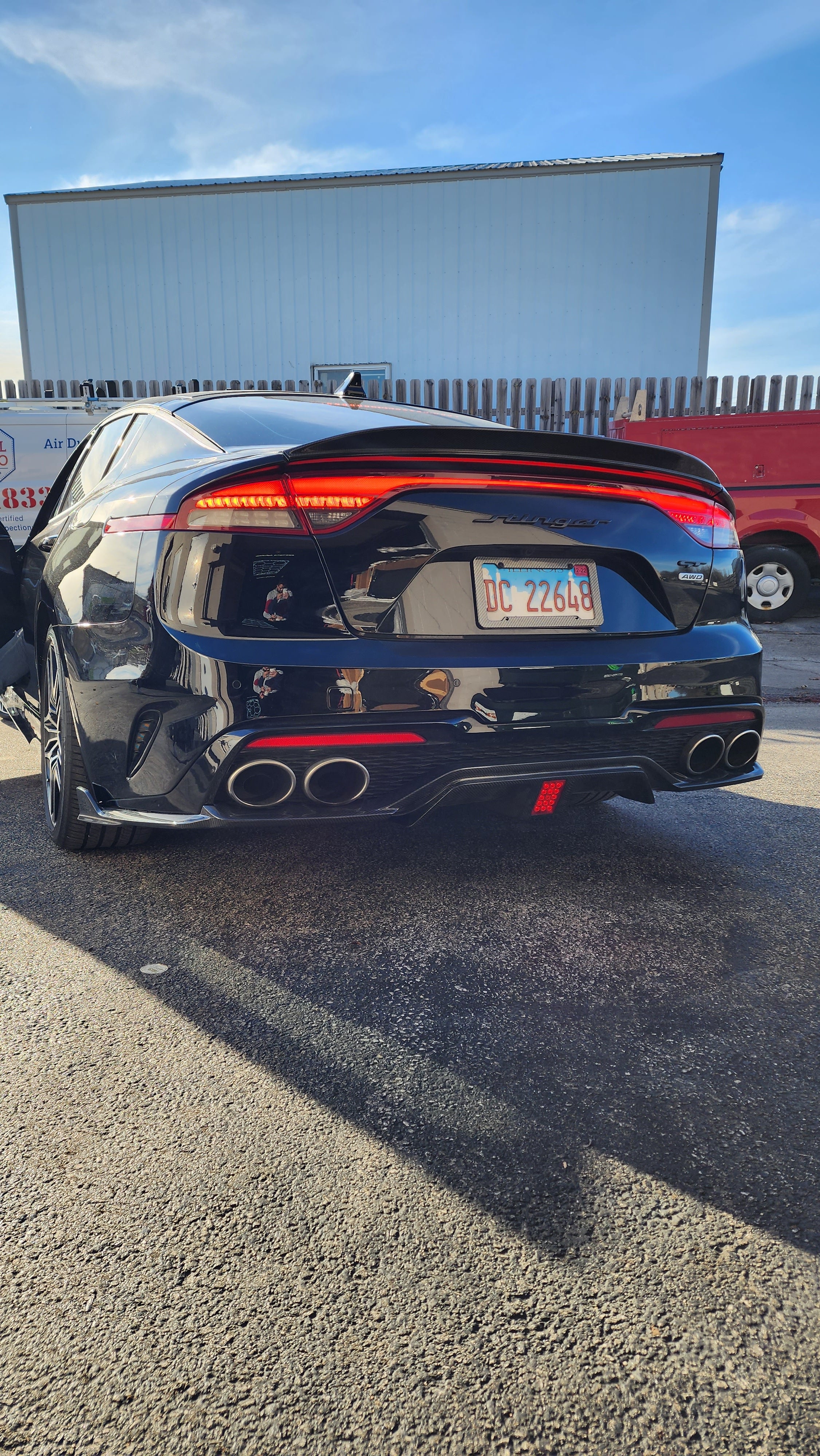 Detailed view focusing on the 3rd Brake Light of the Carbon Fiber Diffuser on the KIA STINGER, demonstrating its functionality and design.