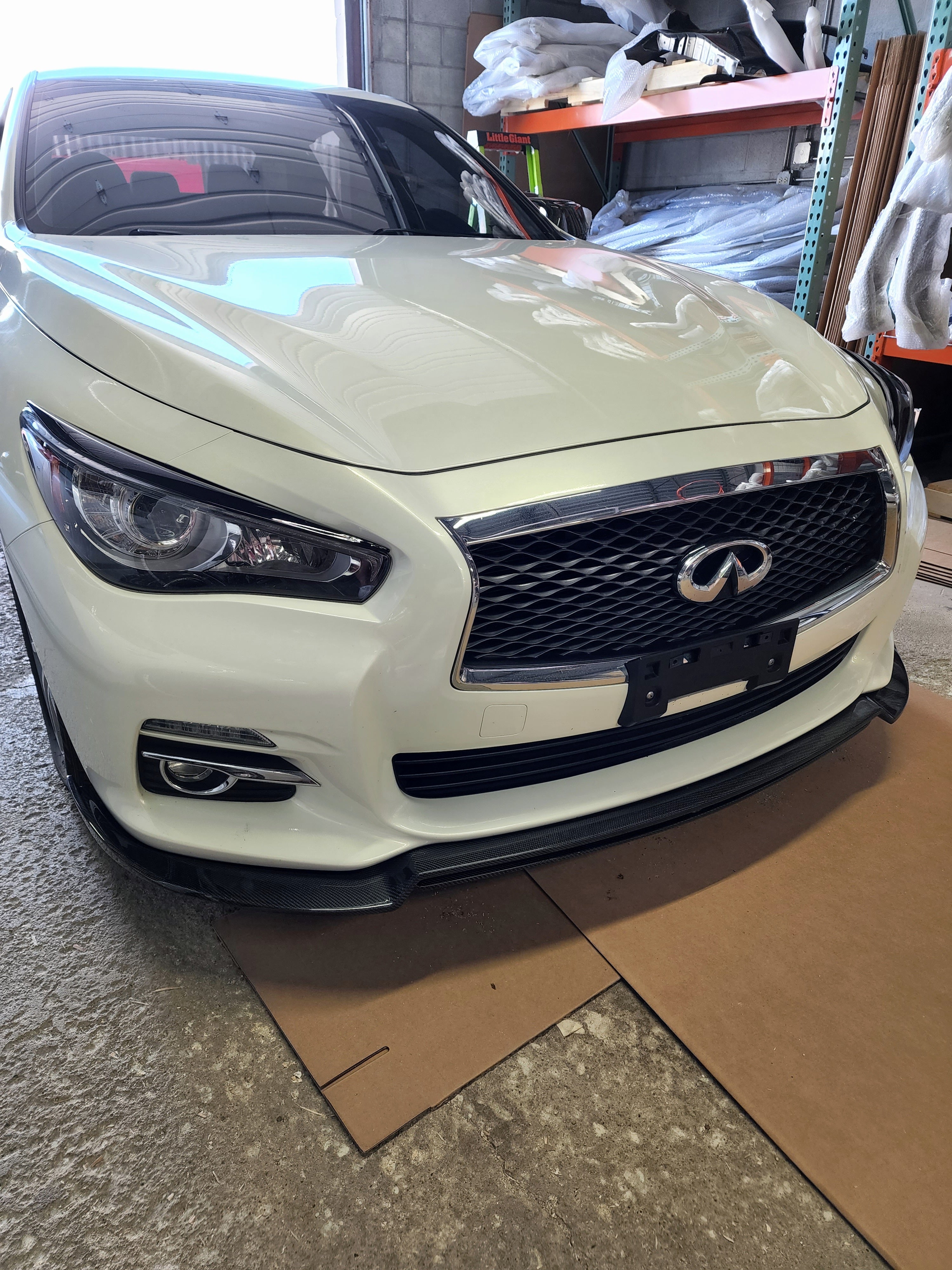 Q50 parked with JCF Carbon Splitter, demonstrating the splitter's integration with the vehicle's design.