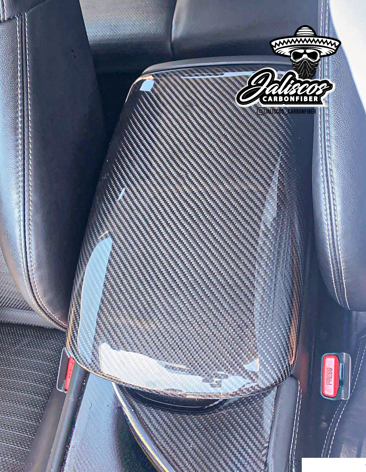 Jalisco's CF Carbon Fiber Arm Rest, a full replacement for OEM showing the sleek design in an Infiniti Q50/Q60 interior.