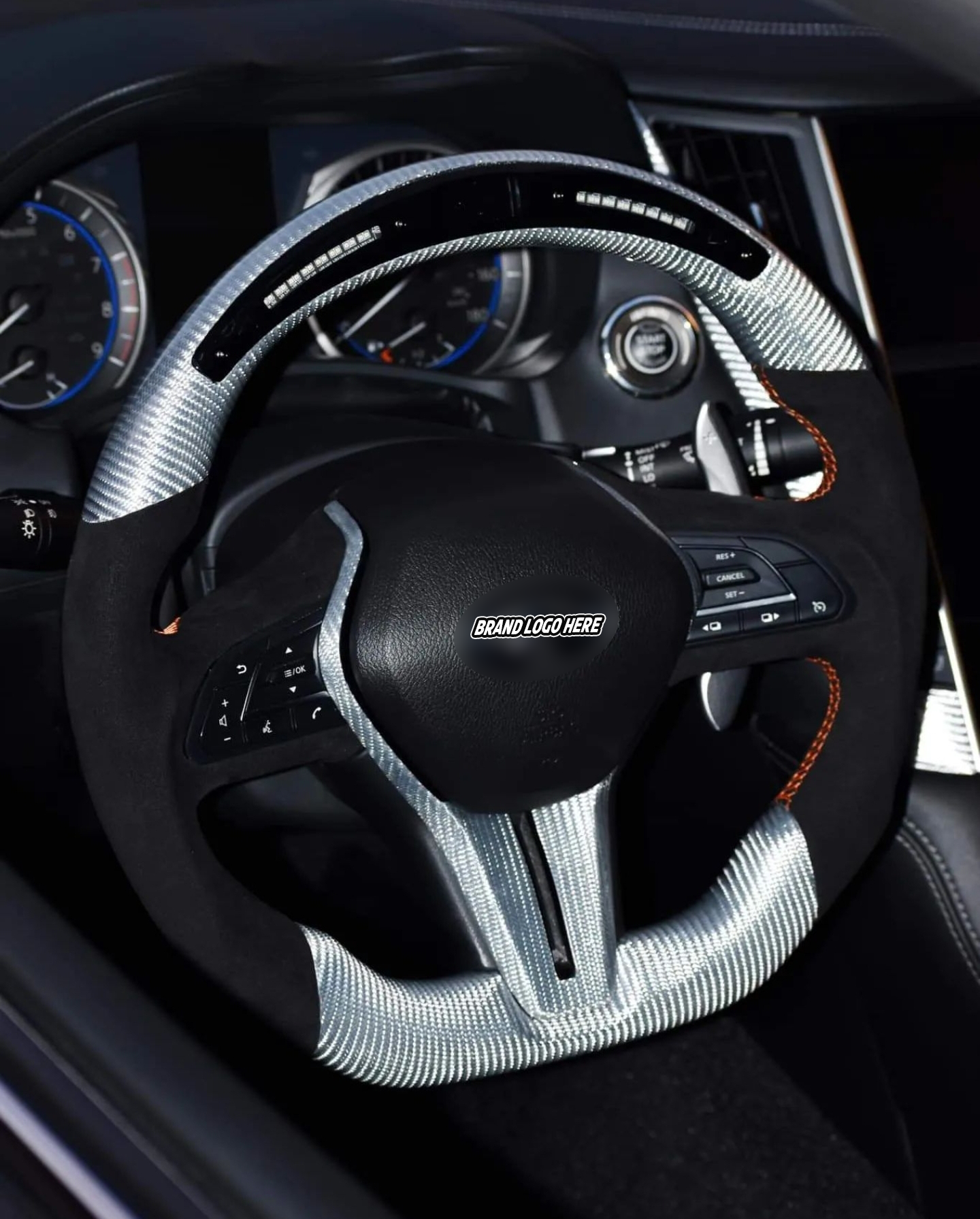Jalisco's gray carbon fiber steering wheel with suede-like grips and LED screen top for Infiniti Q50/Q60.
