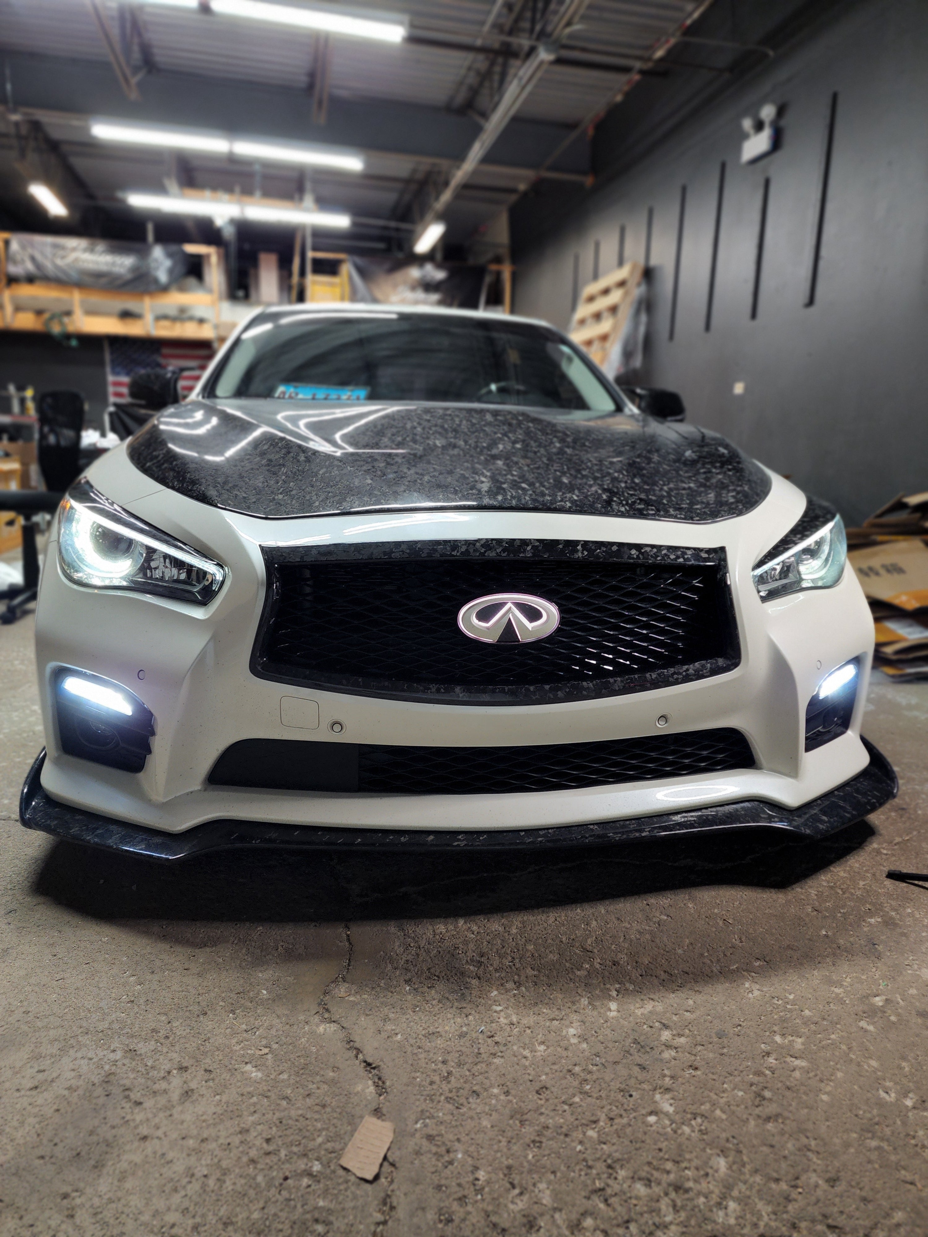 Real Carbon Fiber Eyelid Overlay for Infiniti Q60 2017+, highlighting the sleek design and fit on the headlight top section.