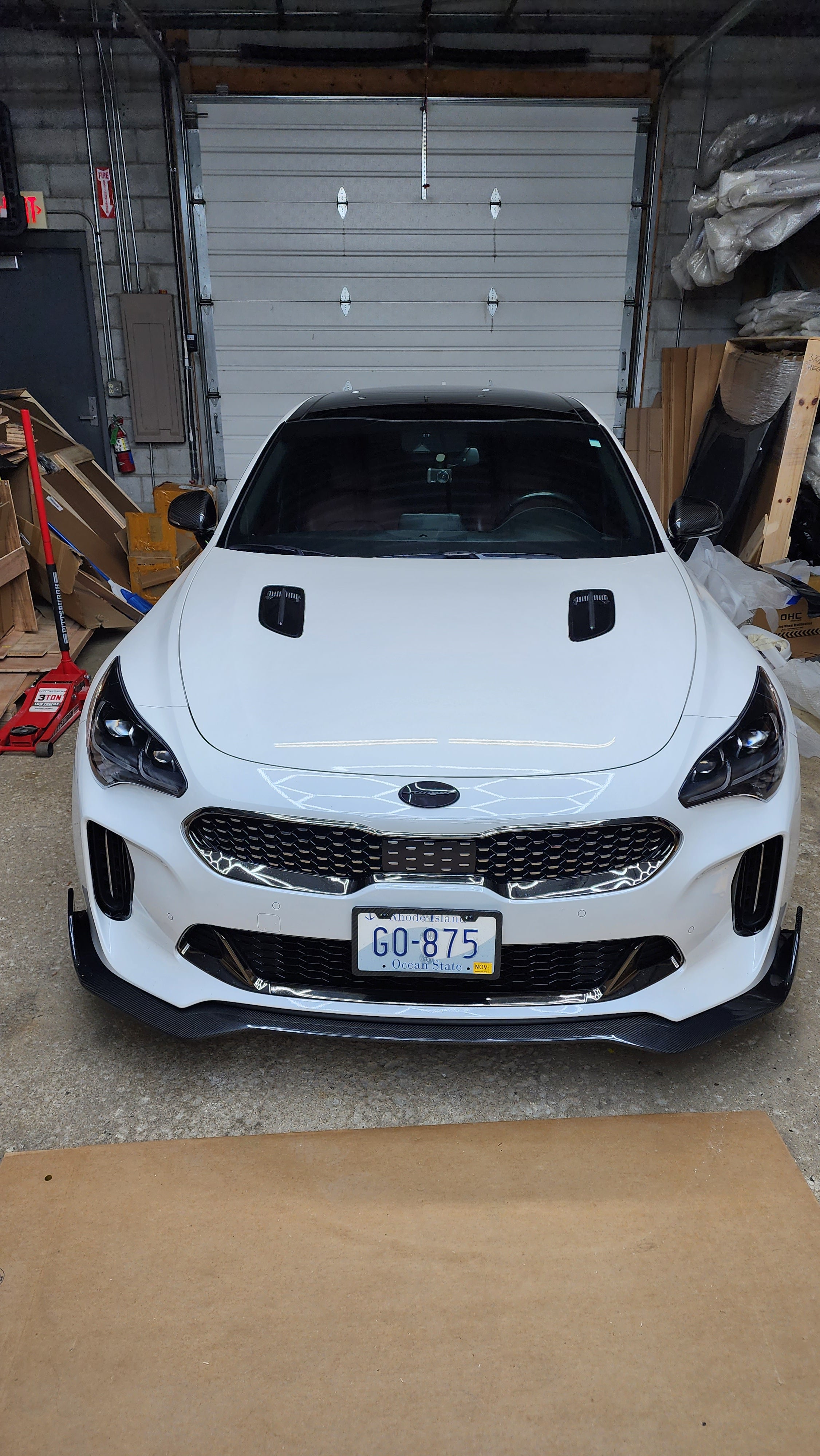 Wide front shot of the Kia Stinger with Jalisco's Front Lip, illustrating how the lip complements the vehicle's dynamic front fascia.
