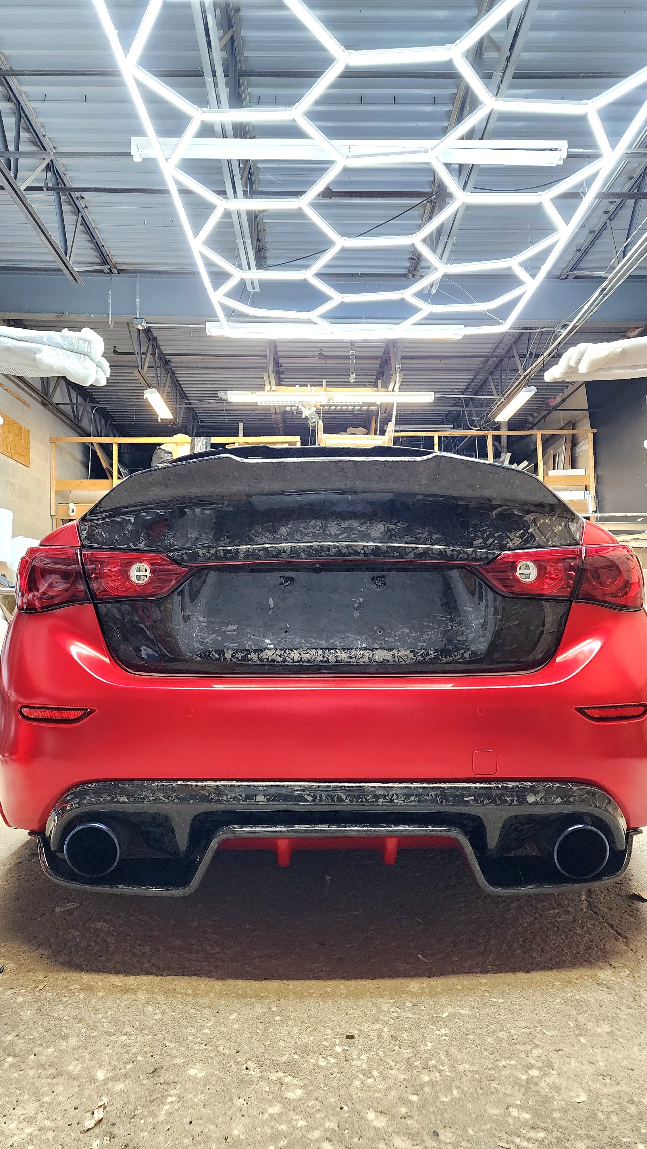 JCF's Carbon Fiber Trunk on Q50, pre-drilled holes for a near OEM fitment