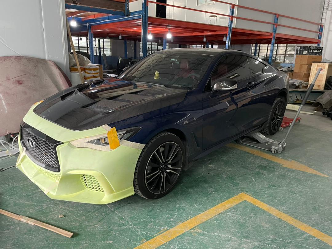 JCF Carbon Fiber Front Bumper pre-fitted on a Q60, highlighting customizability.