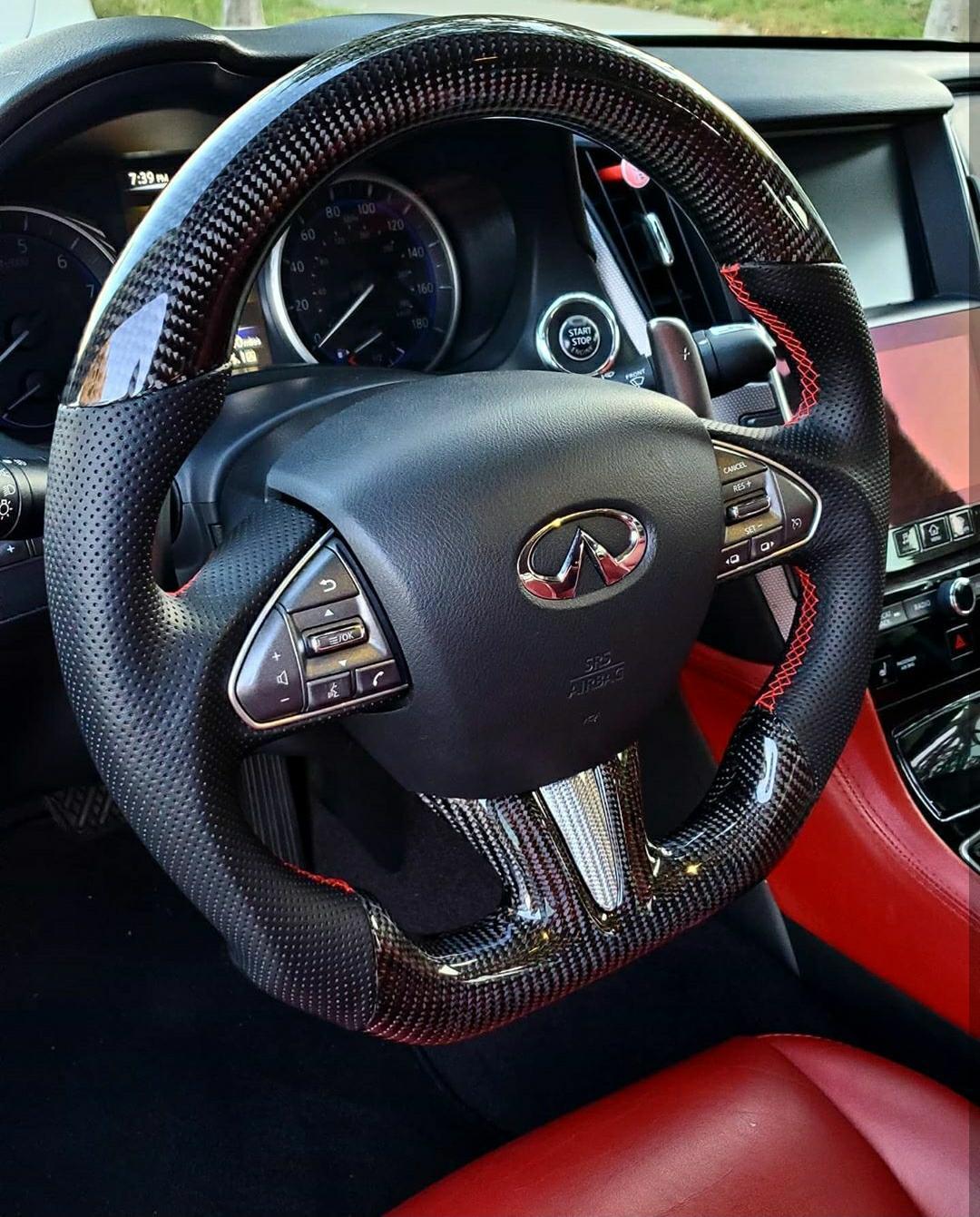 Classic CarbonFiber Steering Wheel design with leather grips, red stitching, and a standard airbag cover for Infiniti Q50 2014-2017.