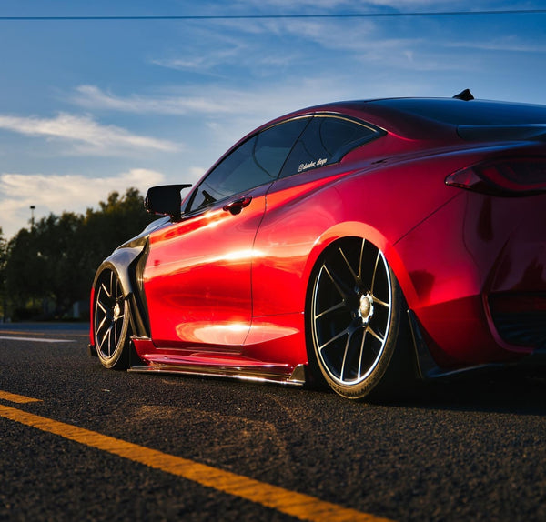 Infiniti Q60 with newly installed Jalisco Carbon Fiber Fenders viewed from the rear angle