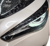 Load image into Gallery viewer, Real Carbon Fiber Eyelid Overlay for Infiniti Q60 2017+, highlighting the sleek design and fit on the headlight top section.